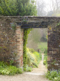 View Through a Gateway and into the Garden Beyond  Hadspen Gardens Somerset