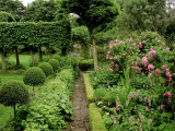 Stone Path Leading Between Parterre Herb Garden and Lawn Area