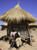 Children by Straw Huts  South Africa