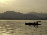Twilight View of a Small Boat on West Lake  China