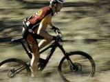 Close up of Fast Moving Mountain Biker  Mt Bike