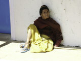 Old Woman Sitting Against a Wall  Nepal