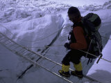 Climbing Across Ladder on Everest  Nepal