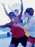 Group of Young Women Playing Basketball