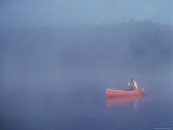 Canoe on a Misty Lake