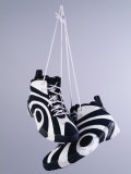 Sneakers Dangling by the Laces