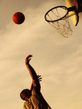 Side Profile of a Mid Adult Man Playing Basketball