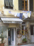 Laundry on the Line Above a Storefront
