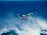 Man Windsurfing in the Sea