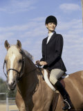 Jockey Sitting on a Horse