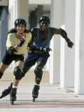 Man and Woman in Rollerblades