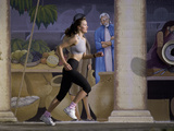 Young Woman Running on the Sidewalk