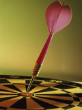 Close-up of a Dart in the Bull's-Eye of a Dartboard