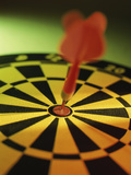 Close-up of a Dart in the Bull's-Eye of a Dartboard