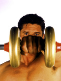 Young Man Lifting a Dumbbell