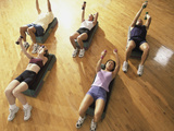 High Angle View of a Group of People Exercising in a Step Aerobics Class