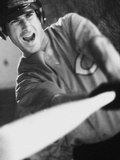 Baseball Player Swinging a Bat