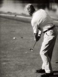 Rear View of a Man Playing Golf