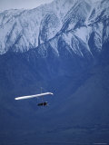 Hang Glider in Front of a Snow Capped MOuntain