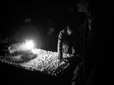An Afghan Vendor Sells Eggs by Lantern Light