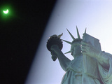 An Annular Eclipse Passes Above the Statue of Liberty