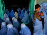 Afghan Women Wearing Burqas Listen to a Speech by Presidential Candidate Massooda Jalal