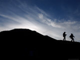 Two Girls Walk Around the Sun Pyramid at Teotihuacan Archeological Site