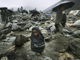 A Pakistani Earthquake Survivor Shivers