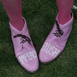 A Code Pink Member Demonstrates Her Feelings for President Bush During a Rally Opposing the War