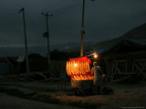 A Boy Prepares to Sell Bread