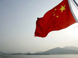 A Chinese Flag Flutters