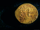Gold Coin with Enthroned Archer and Greek Inscription  Six Tombs of Bactrian Nomads