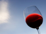 Red Wine Glass Against a Blue Sky  Paris  France
