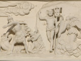Close-up of Figures Carved into a Stone Wall