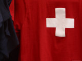 Close-up of the Swiss Flag with a Whtie Cross on Red Fabric