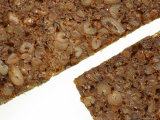 Close-up of Rough Brown Granola Bars with Chunks of Grains