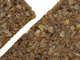 Close-up of Rough Brown Granola Bars with Chunks of Grains