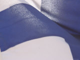 Close-up of the Flag of Finland on White Fabric with Blue Detail