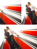 Snapshots of Man and Woman Kissing on Bright Colorful Escalator