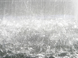 Heavy Raindrops Splashing on the Water