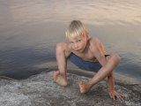 Child Playing on Beach