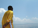 Man Standing on a Boat