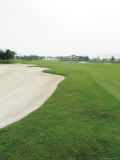 A Landscaped Golf Course with Sand Trap