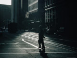 Man Crossing Street with Cable Car Looming in Background  San Francisco  California  USA