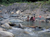 Women Washing Clothes in the River