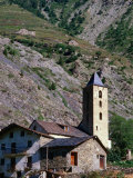 Belltower and Stone Buildings of a Village in the Dordogne Hills  France