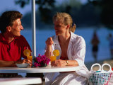Couple Enjoying Drinks on Beach  Sunset Crest  Barbados