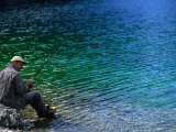 Man Fishing in Nizhny Lake  Kazakhstan
