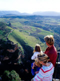 Family Looking at Countryside from Lookout  Ronda  Spain