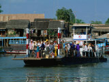 Loaded Passenger Ferry Crossing Canal in Mekong Delta  Chau Doc  an Giang  Vietnam